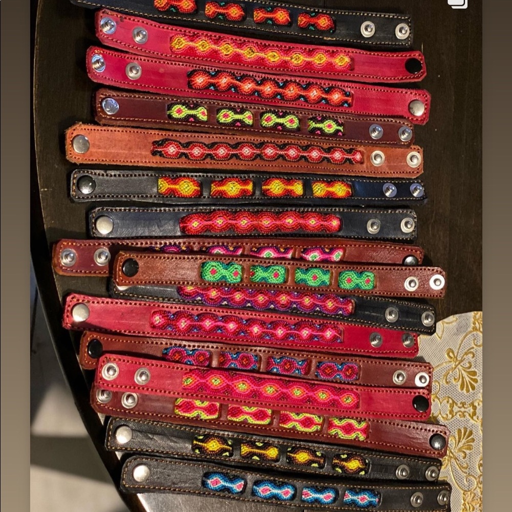 Bracelets genuine embroidered leather.